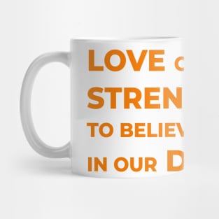 Love gives us the strength to believe in our dreams Mug